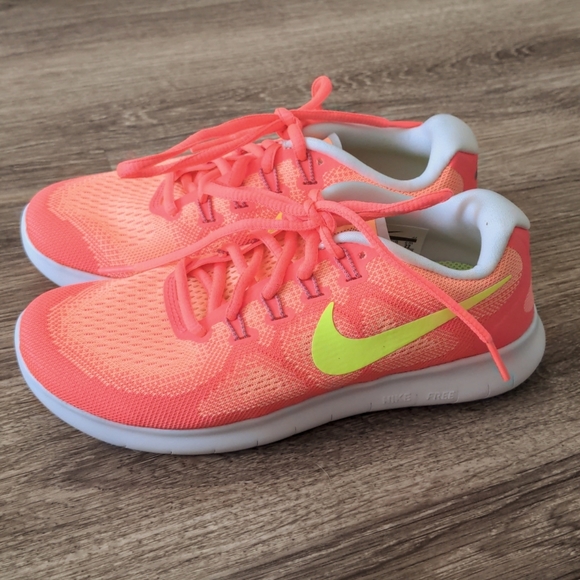 Nike Shoes - Nike Free RN 2017 Pink and Yellow Running Shoes